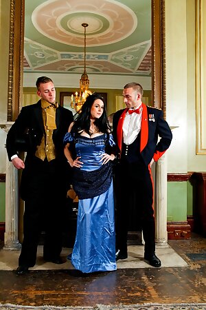 Hot British pornstar Louise Jenson fully clothed in royal costume